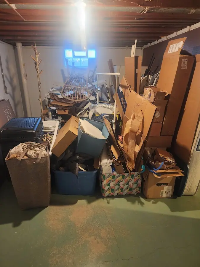 Roll-off dumpster container at job site for 15 Yard Dumpster Rental in Murray